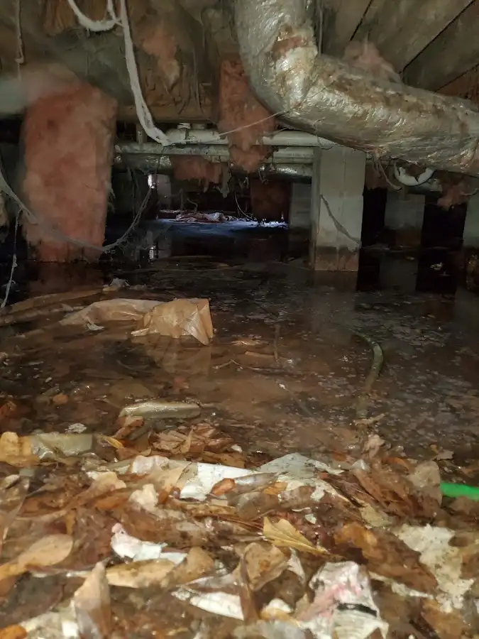Crawl space flood assessment for Commercial Water Damage Restoration in Grand Forks