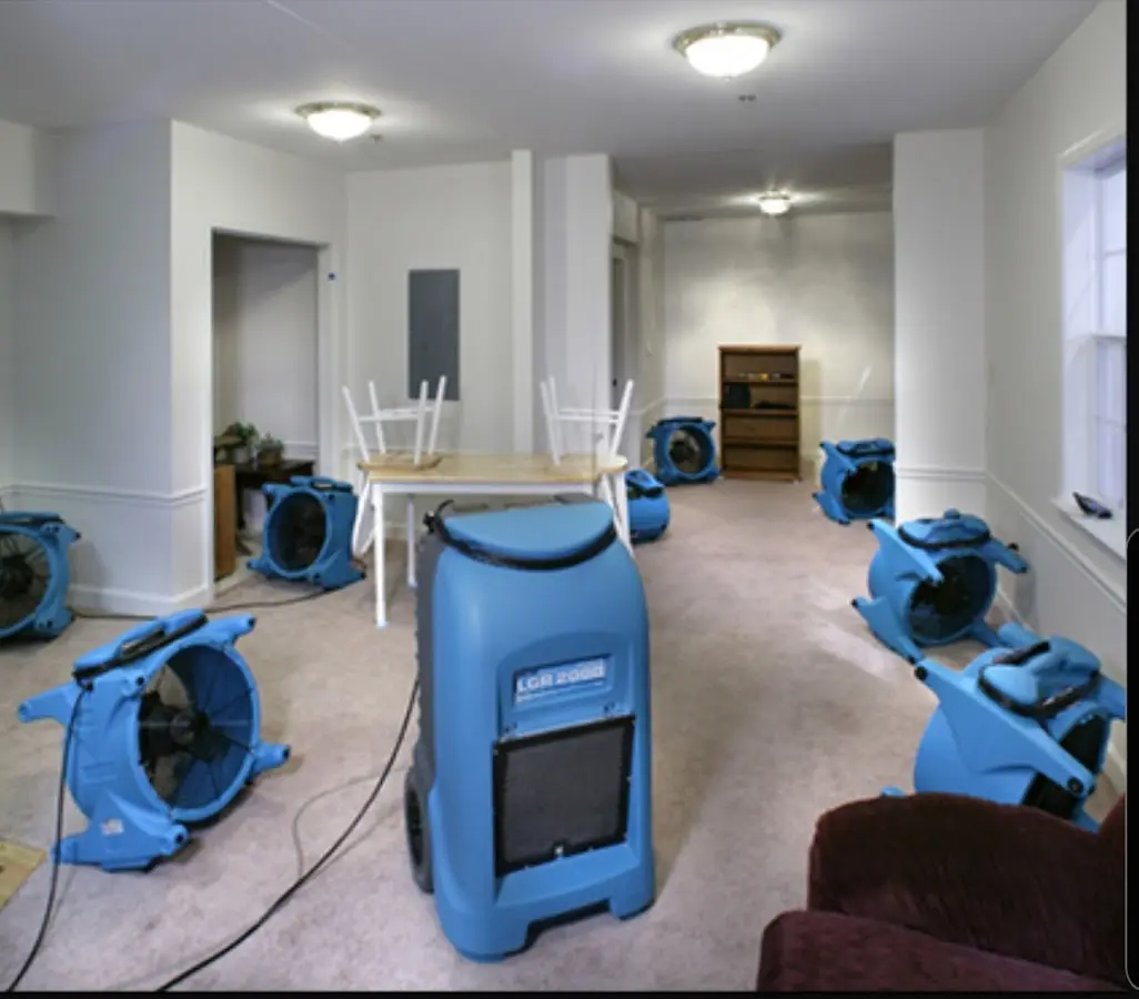 Air movers and dehumidifier setup for Water Extraction & Removal in Grand Forks